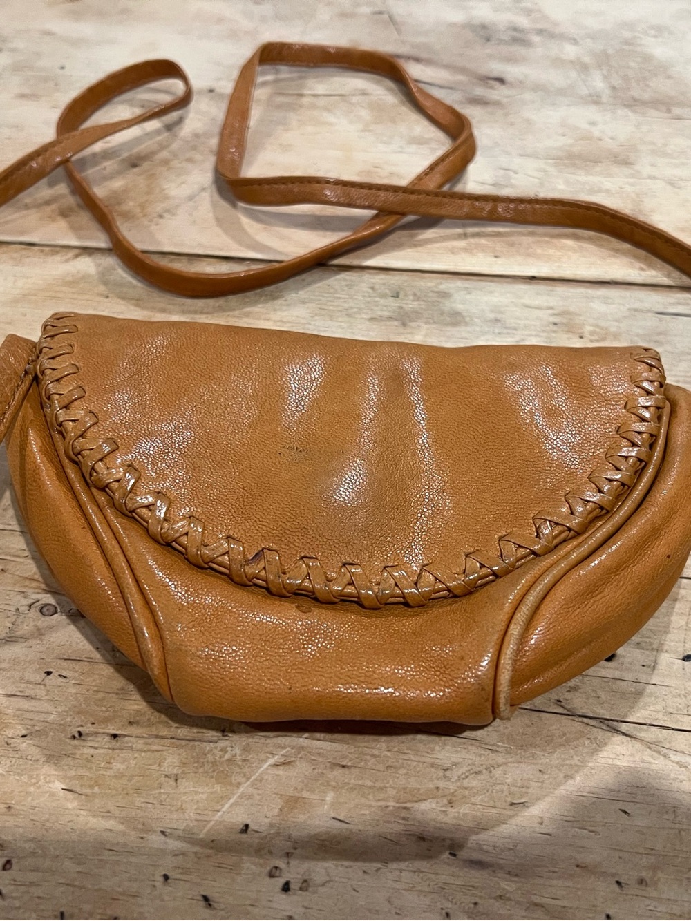 Hobo mini cross body, honey colored leather